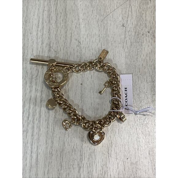 Brand New Coach Pearl Heart Padlock Charm Toggle Bracelet Price Tag $148 - Picture 1 of 9